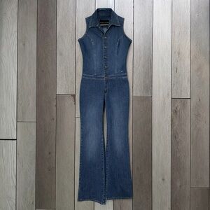 Sergio Valente vintage denim sleeveless jumpsuit featuring a button-up front